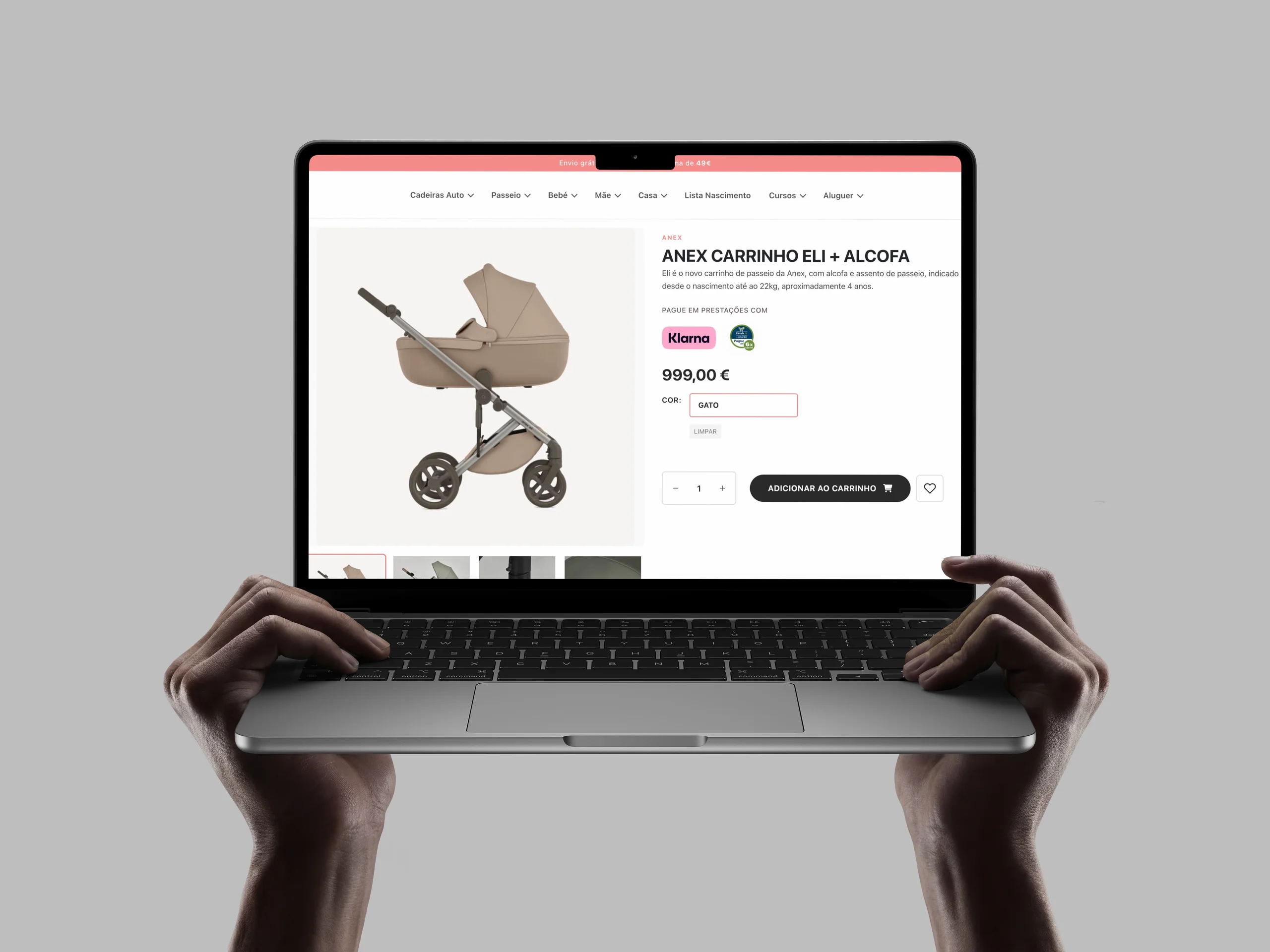 A ficha de produto em portátil, com o carrinho de passeio Anex Eli + Alcofa, preço e opções de cor.